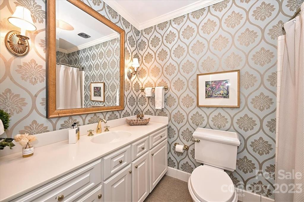 3724 Merrifield Road Charlotte, NC 28211 - Photo 26 of 48 a bathroom with a sink and a mirror
