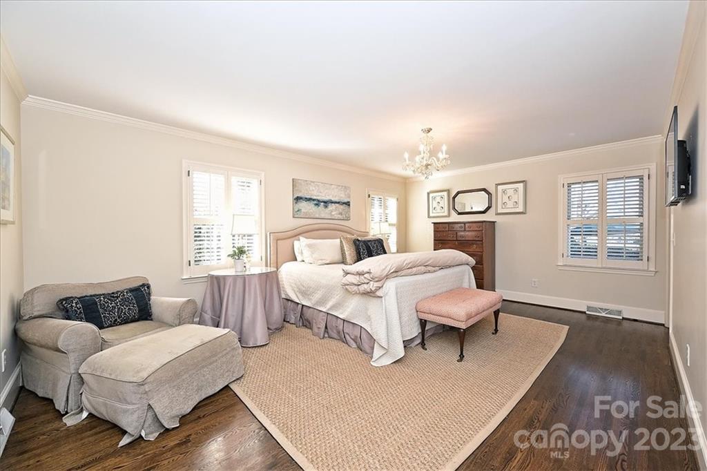 3724 Merrifield Road Charlotte, NC 28211 - Photo 27 of 48 a bedroom with two beds and a large window