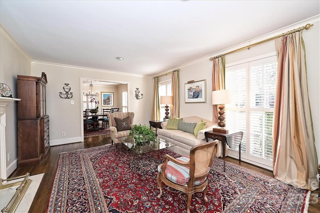 3724 Merrifield Road Charlotte, NC 28211 - Photo 7 of 48 a living room with furniture rug and a window