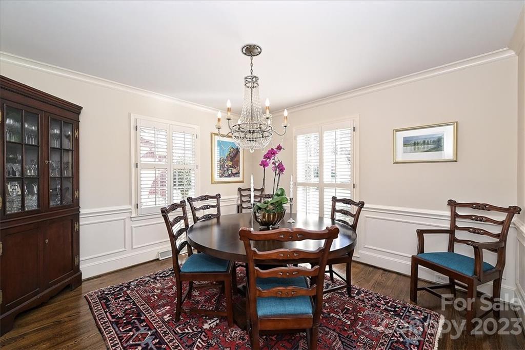 3724 Merrifield Road Charlotte, NC 28211 - Photo 10 of 48 a view of a dining room with furniture window and wooden floor