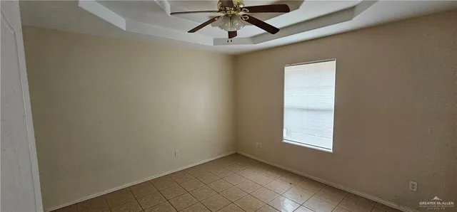 a kitchen with granite countertop a sink and a stove
