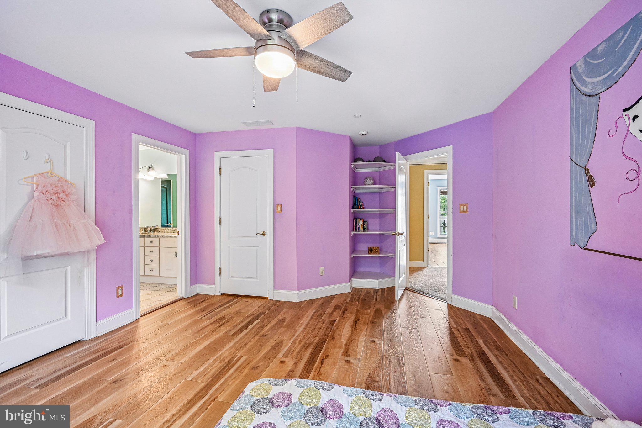 434 Meetinghouse Road Ambler, PA 19002 - Photo 31 of 51 a view of a livingroom with wooden floor and a ceiling fan