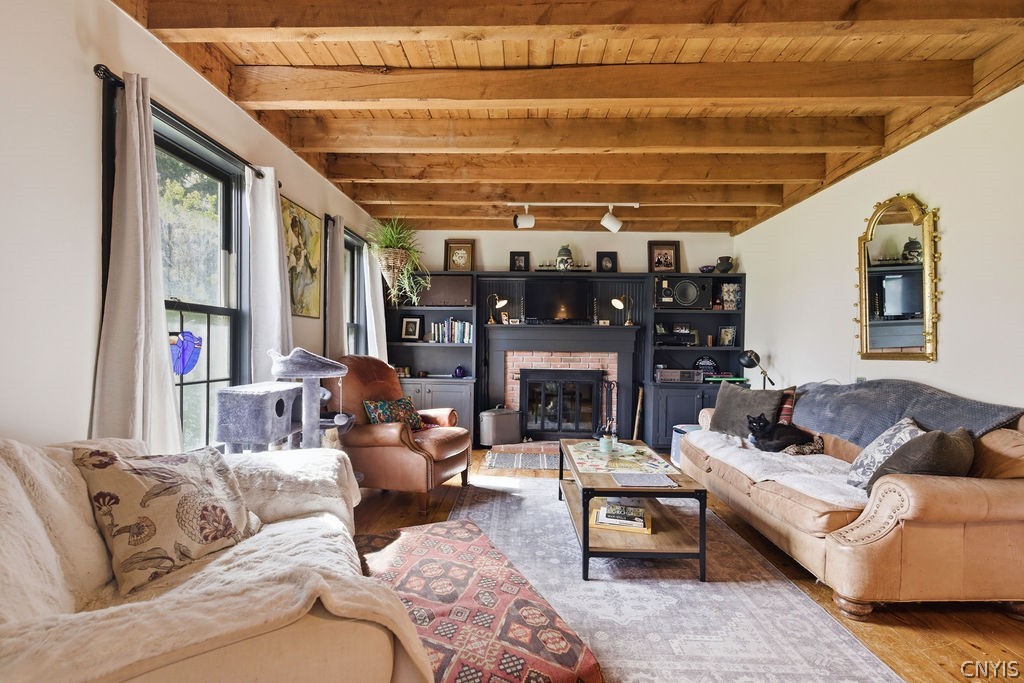 4017 E Road Cazenovia, NY 13035 - Photo 3 of 43 This cozy living room is spacious with a wood burn