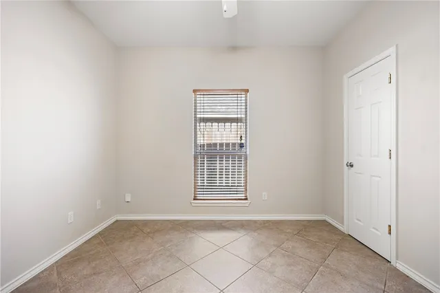 a bathroom with a sink a toilet a shower and a mirror