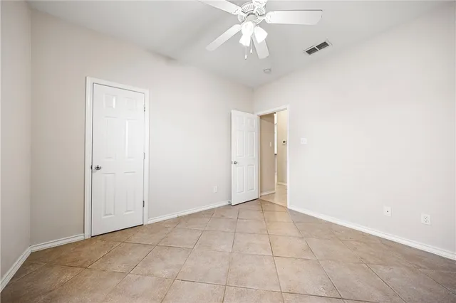 a bathroom with a sink vanity and a mirror