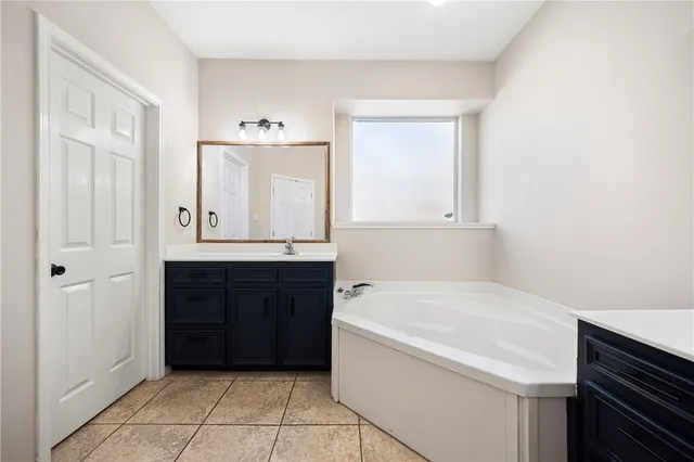 a view of a hallway with white walls