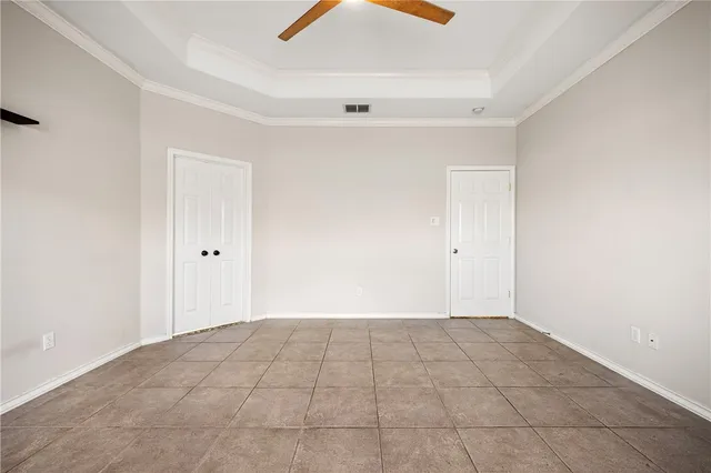 a view of a house with a yard and plants