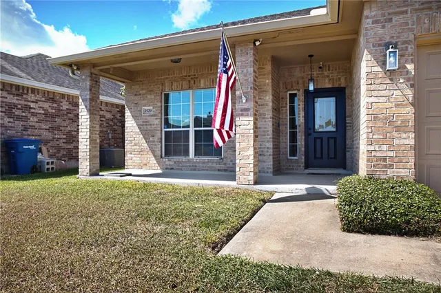 a view of a house with a porch