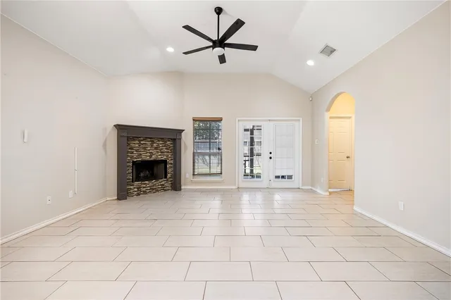 a view of a kitchen with a sink and a window