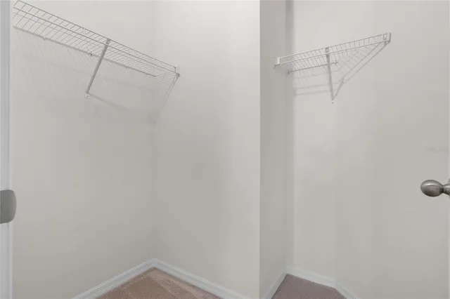 a view of a room with racks on the wall