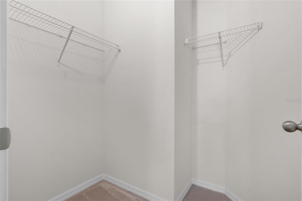 8260 Southwest 59th Avenue Ocala, FL 34476 - Photo 17 of 37 a view of a room with racks on the wall