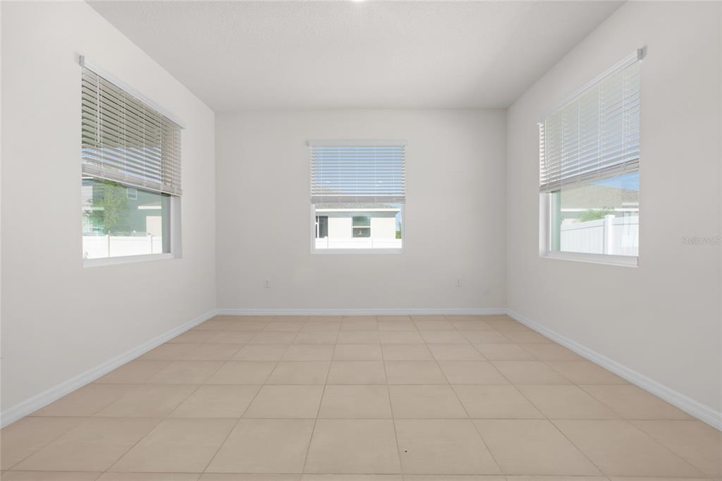 8260 Southwest 59th Avenue Ocala, FL 34476 - Photo 21 of 37 an empty room with a window
