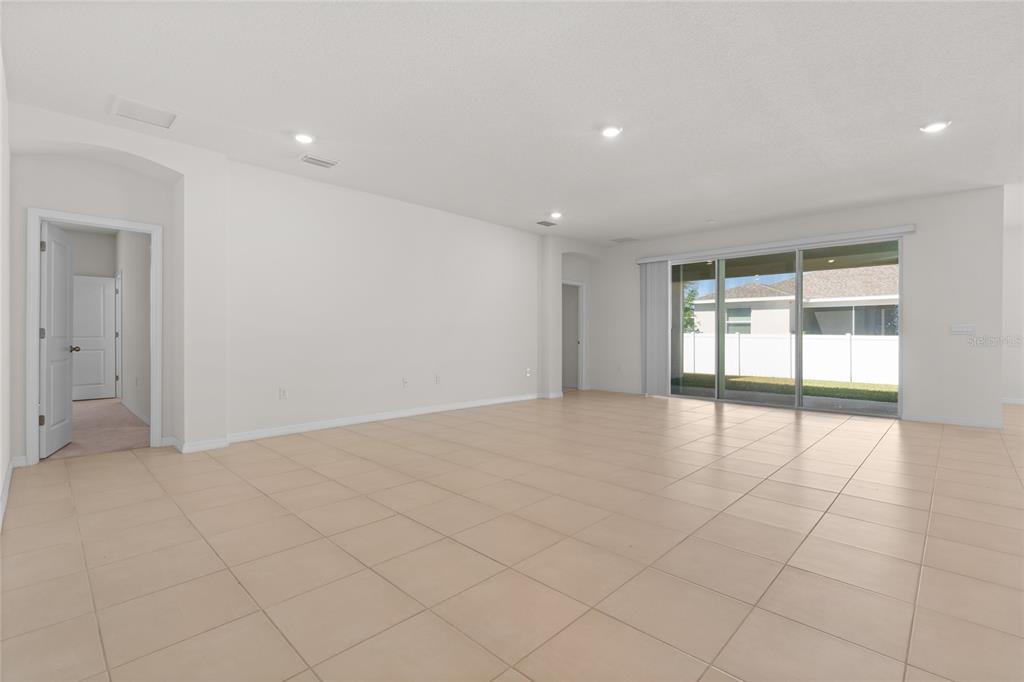 8260 Southwest 59th Avenue Ocala, FL 34476 - Photo 23 of 37 a view of an empty room with a window