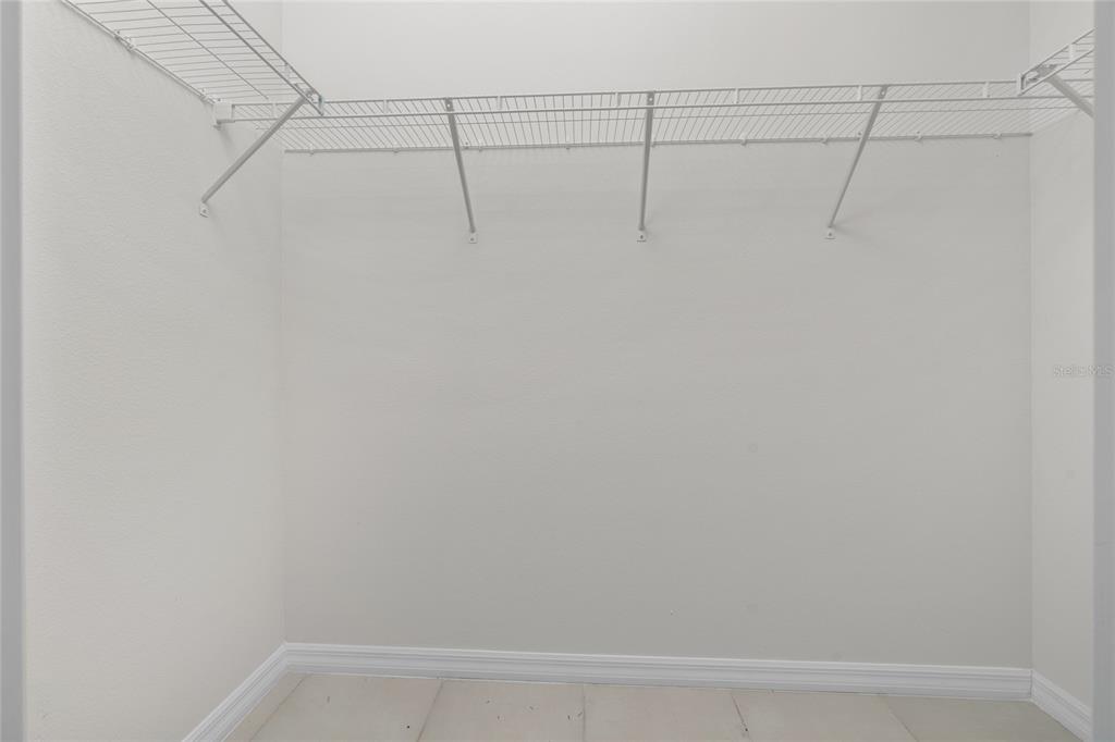 8260 Southwest 59th Avenue Ocala, FL 34476 - Photo 28 of 37 a view of a room with racks on the wall