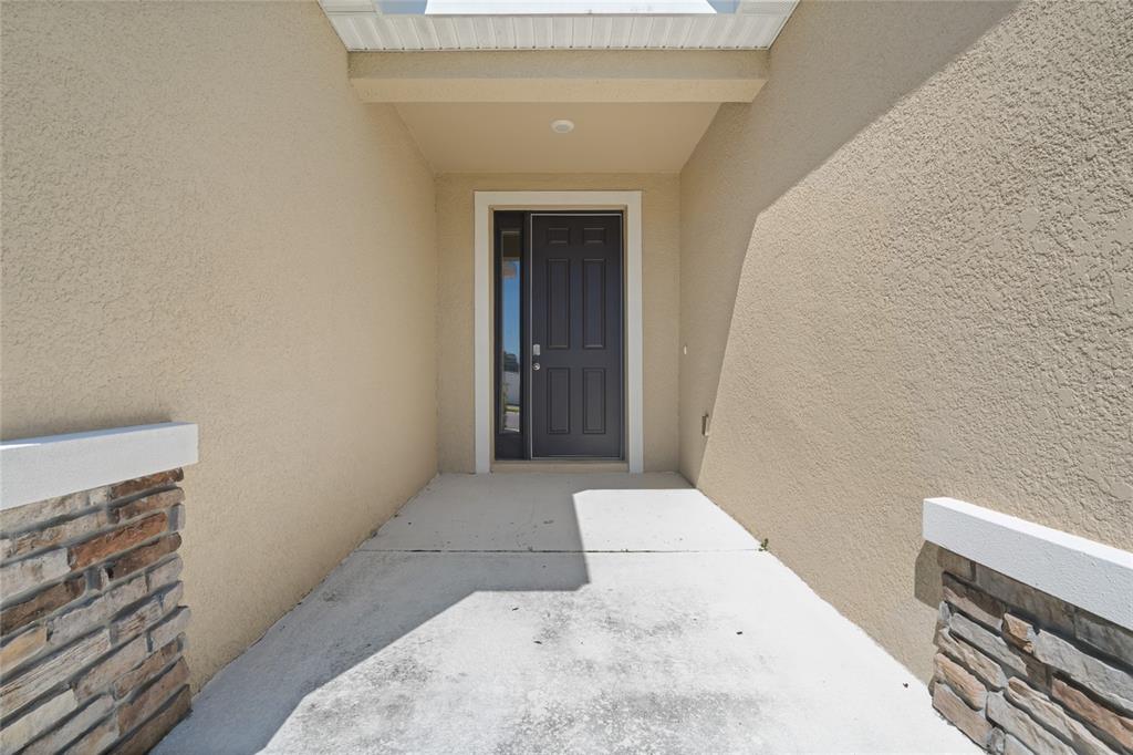 8260 Southwest 59th Avenue Ocala, FL 34476 - Photo 30 of 37 a bedroom with a bed and a window