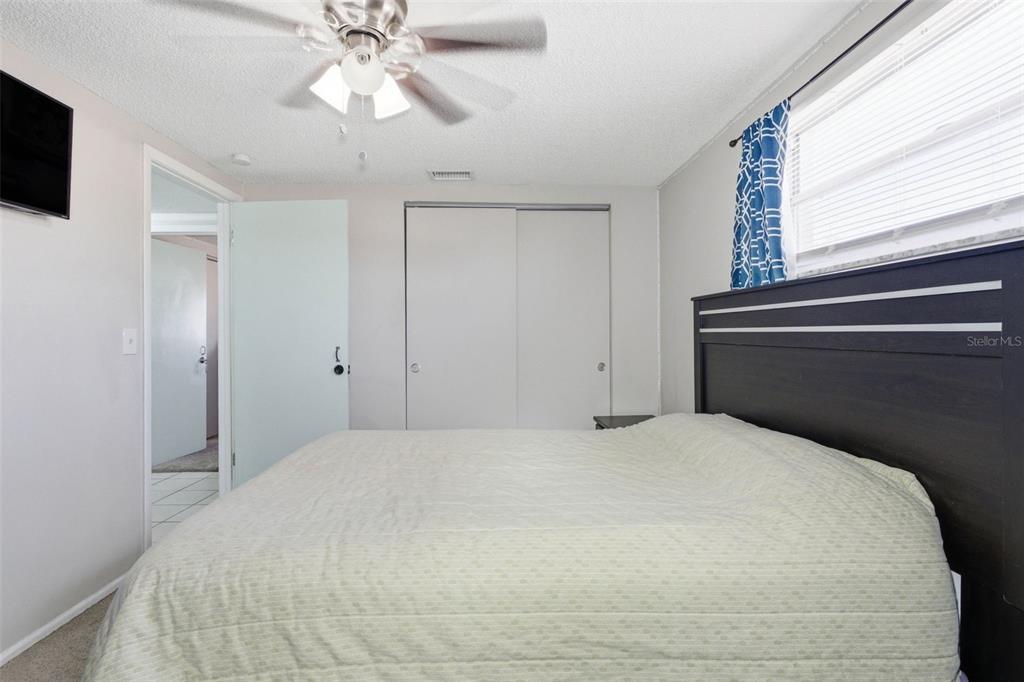 4904 Elmwood Street New Port Richey, FL 34653 - Photo 36 of 57 a large white bed in a white room