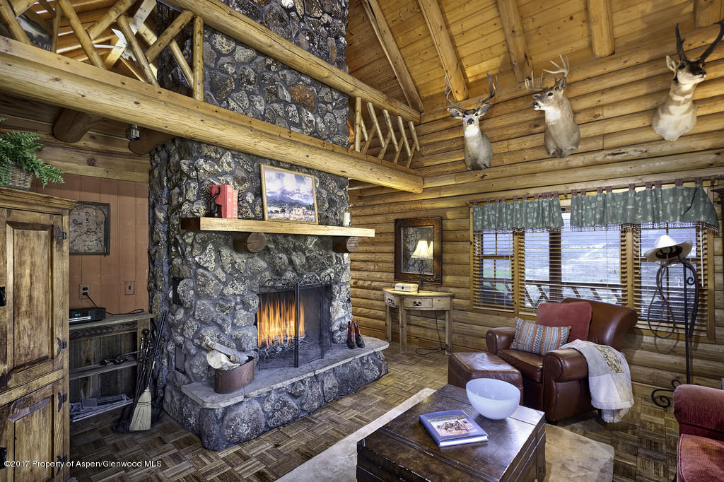 349 Spruce Creek Road Rifle, CO 81650 - Photo 5 of 20 living room with loft overlook