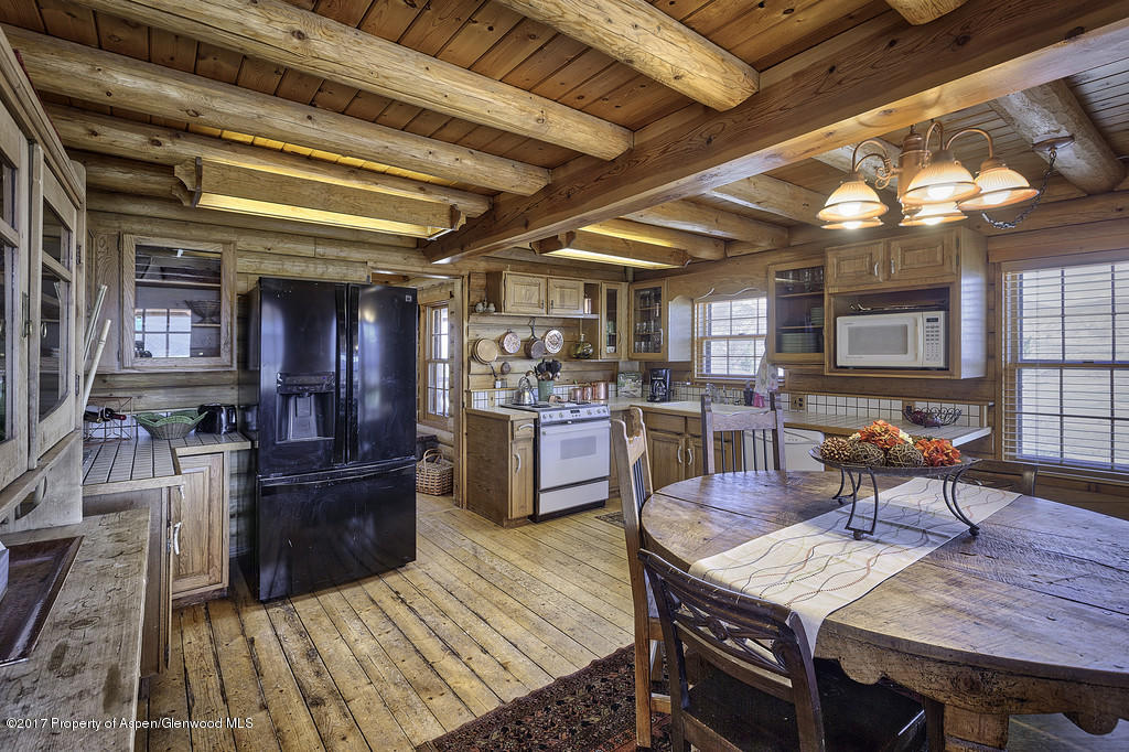 349 Spruce Creek Road Rifle, CO 81650 - Photo 7 of 20 kitchen with rustic charm