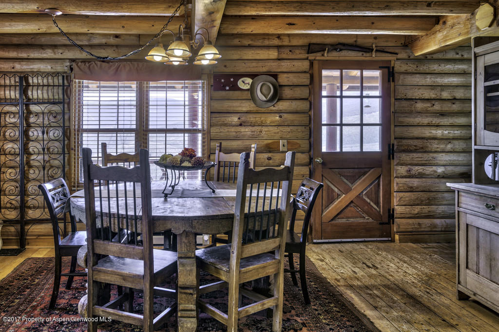 349 Spruce Creek Road Rifle, CO 81650 - Photo 8 of 20 dining area with wood flooring