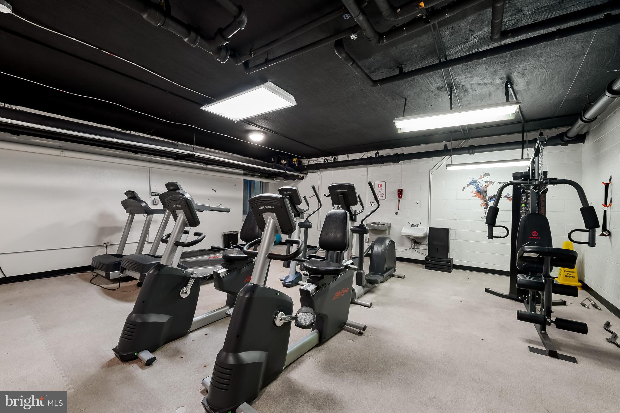 11 Slade Avenue, Unit 911 Baltimore, MD 21208 - Photo 32 of 32 a view of a room with gym equipment