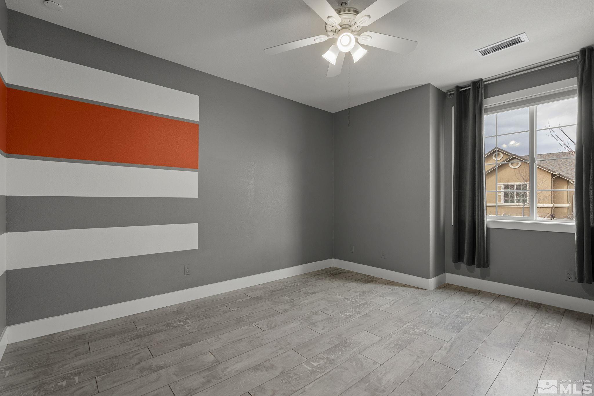 2230 Renzo Way Reno, NV 89521 - Photo 24 of 35 a view of an empty room with a window