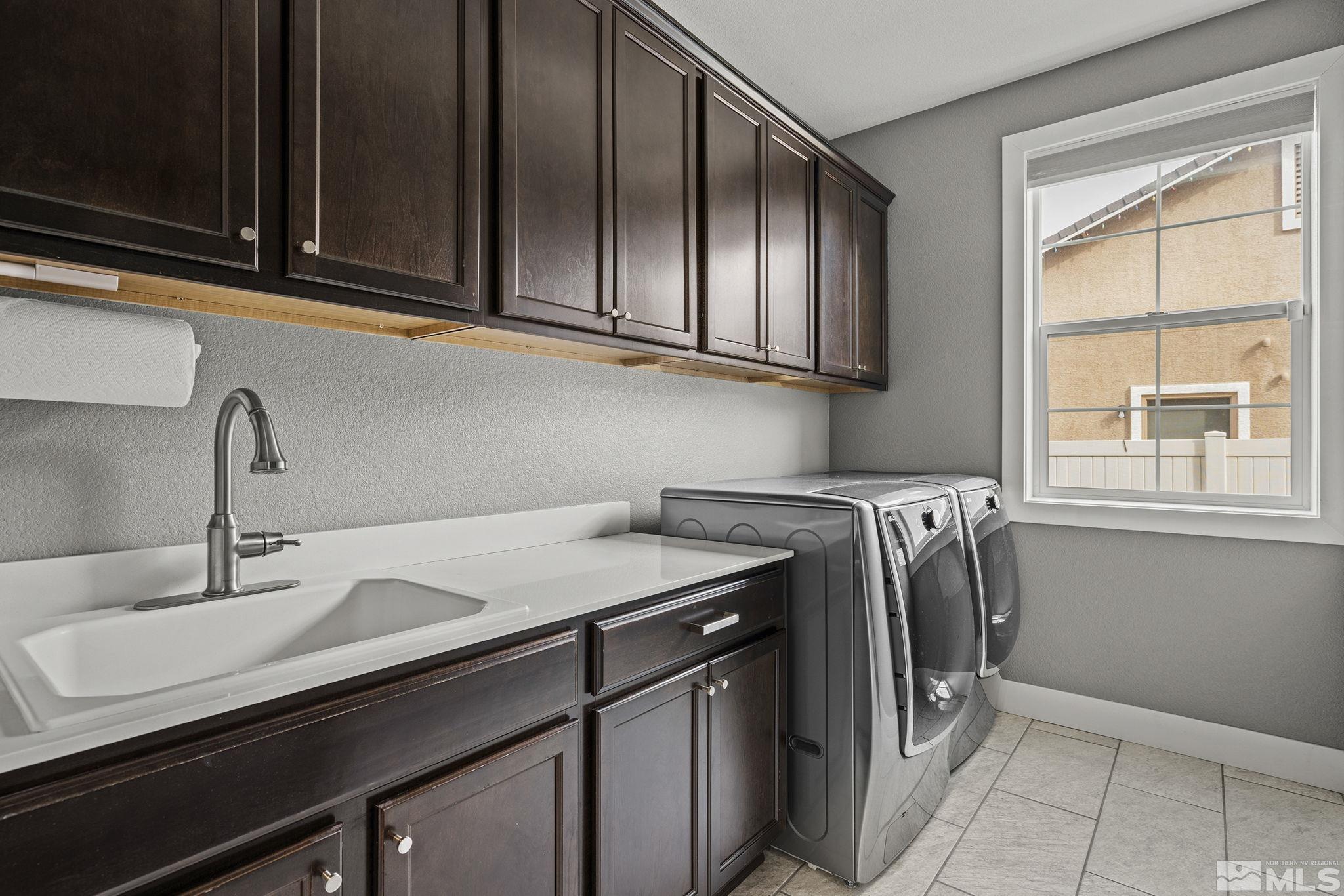 2230 Renzo Way Reno, NV 89521 - Photo 26 of 35 a kitchen with a sink cabinets and window