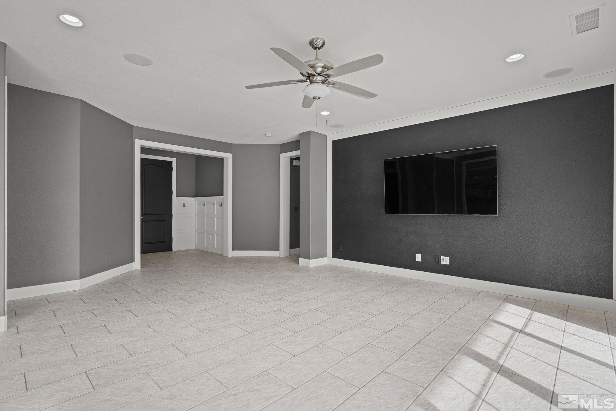 2230 Renzo Way Reno, NV 89521 - Photo 8 of 35 a view of an empty room with a ceiling fan