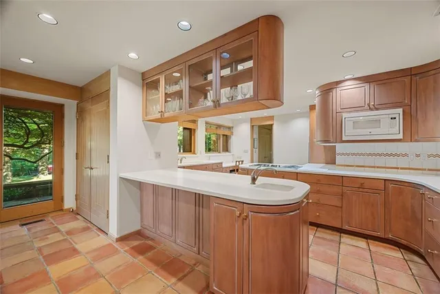 a bathroom with a sink a mirror and a bathtub
