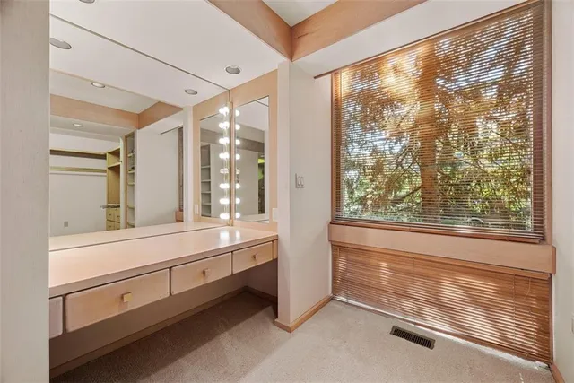 a view of staircase with white walls