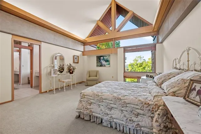a en suite bathroom with a sink and a mirror