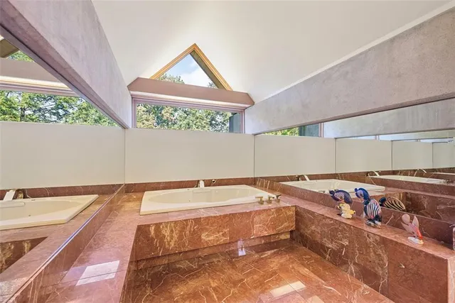 a view of balcony with wooden floor