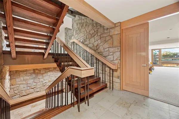 a view of deck with wooden floor and seating space