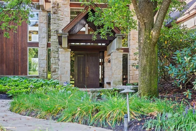 front view of a house with a small yard