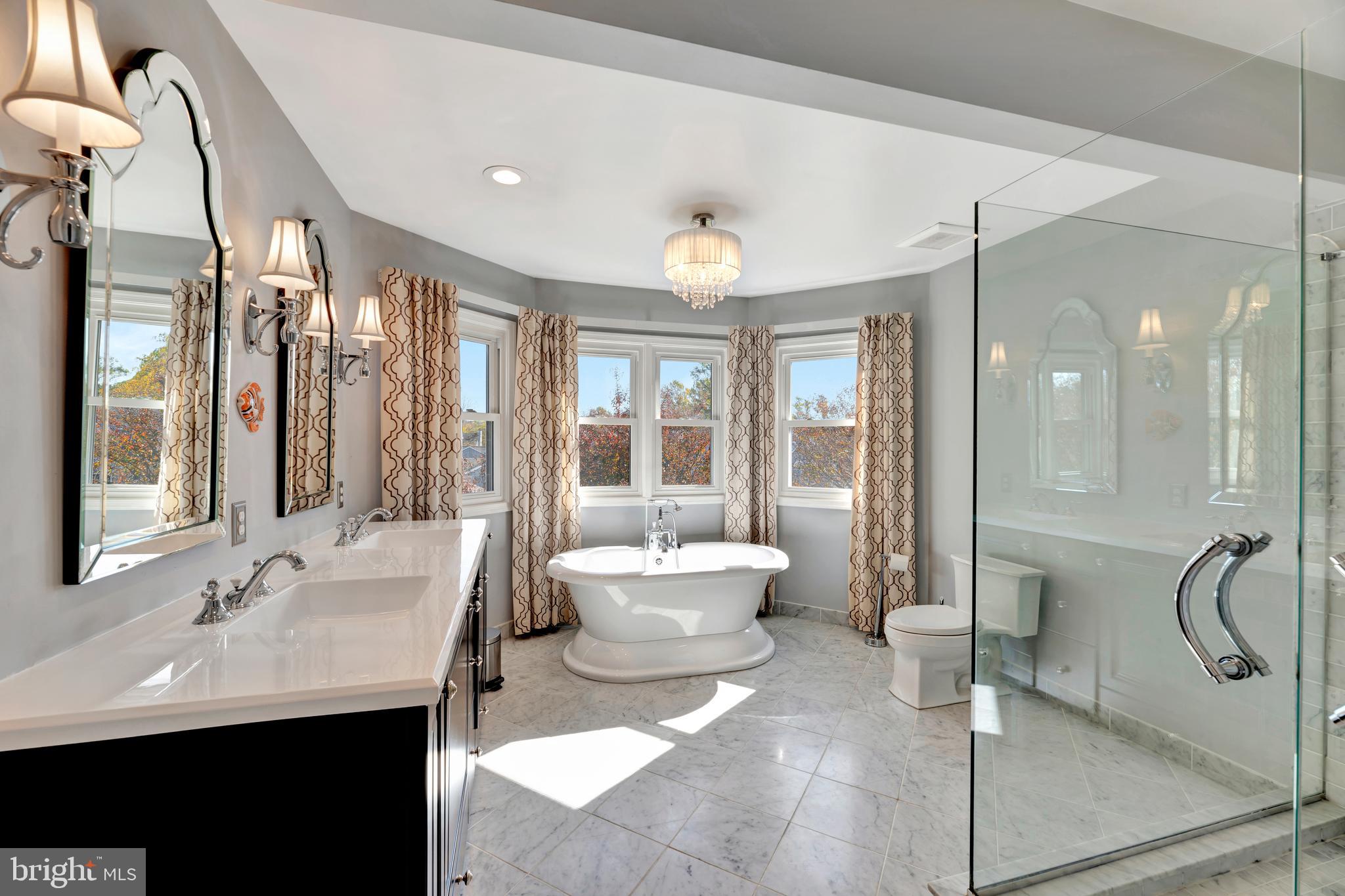 29 Southampton Parish Road Landenberg, PA 19350 - Photo 27 of 56 a spacious bathroom with a bathtub shower sink and mirror