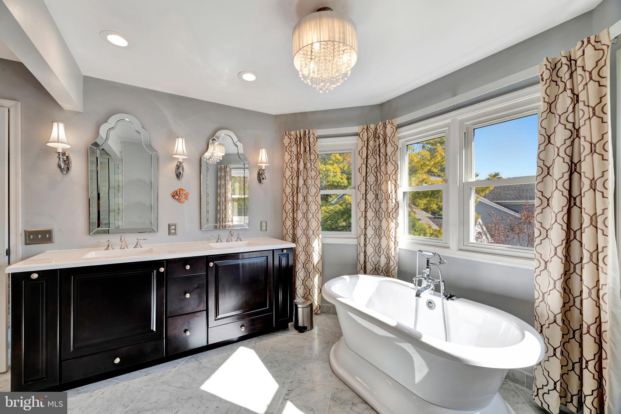 29 Southampton Parish Road Landenberg, PA 19350 - Photo 29 of 56 a spacious bathroom with a double vanity sink mirror and bathtub