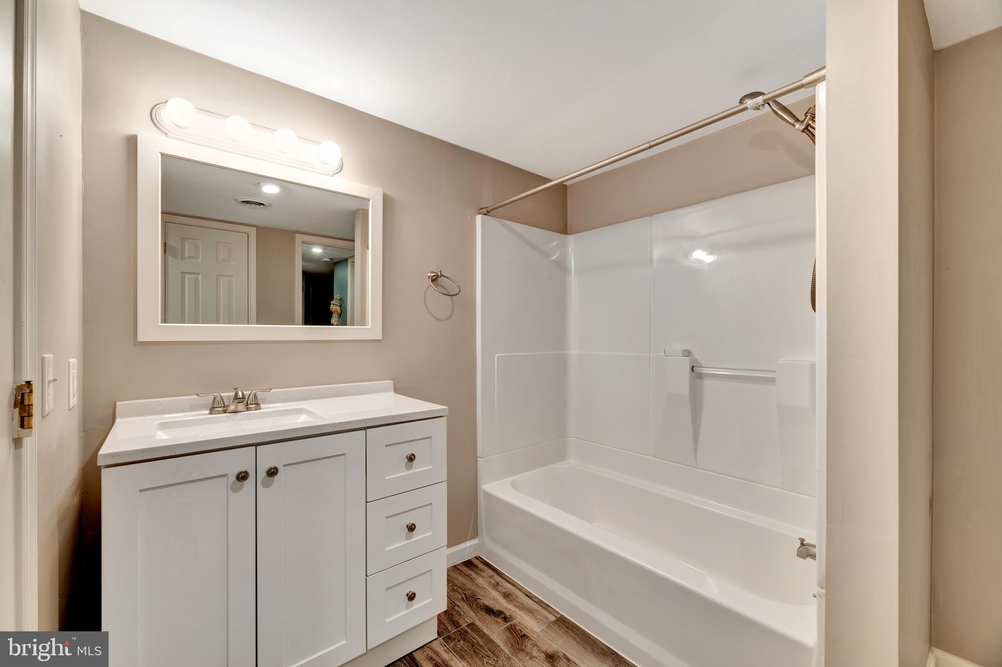 29 Southampton Parish Road Landenberg, PA 19350 - Photo 44 of 56 a bathroom with a tub sink and mirror