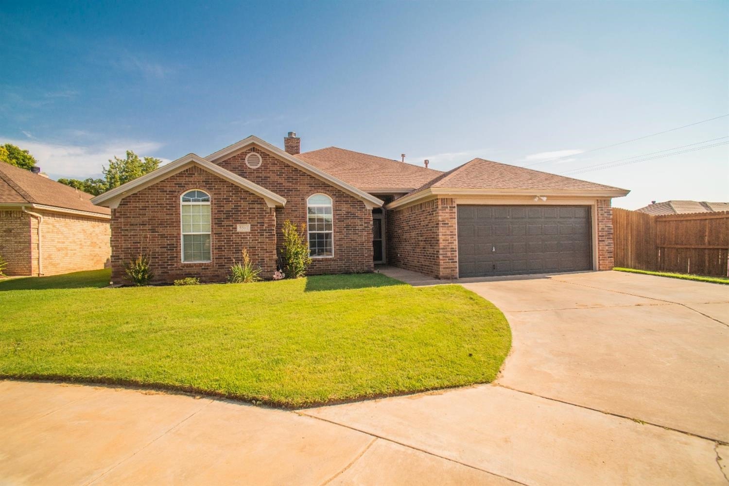5502 103rd Street Lubbock, TX 79424 - Photo 1 of 15 a view of a large house with a swimming pool