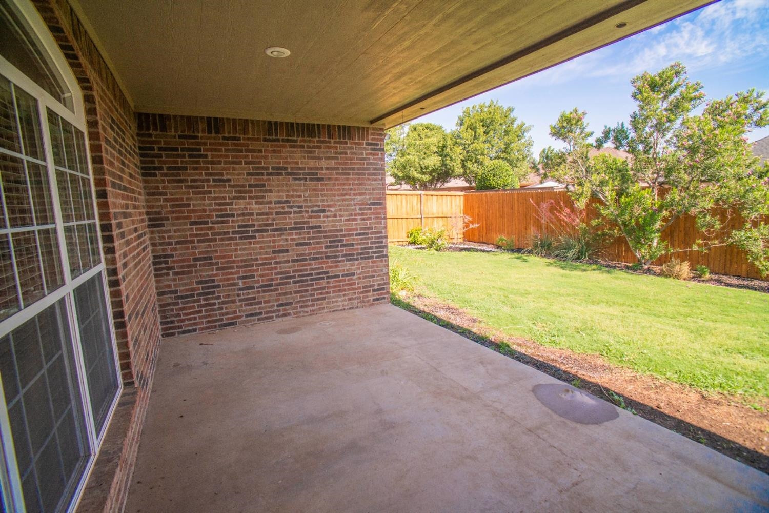 5502 103rd Street Lubbock, TX 79424 - Photo 14 of 15 a view of an empty room with a window
