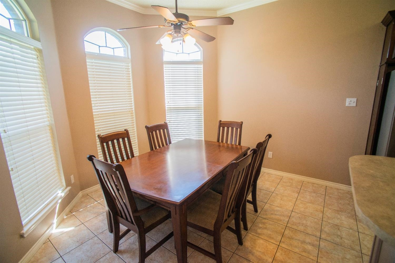 5502 103rd Street Lubbock, TX 79424 - Photo 6 of 15 a view of a dining room with furniture and window