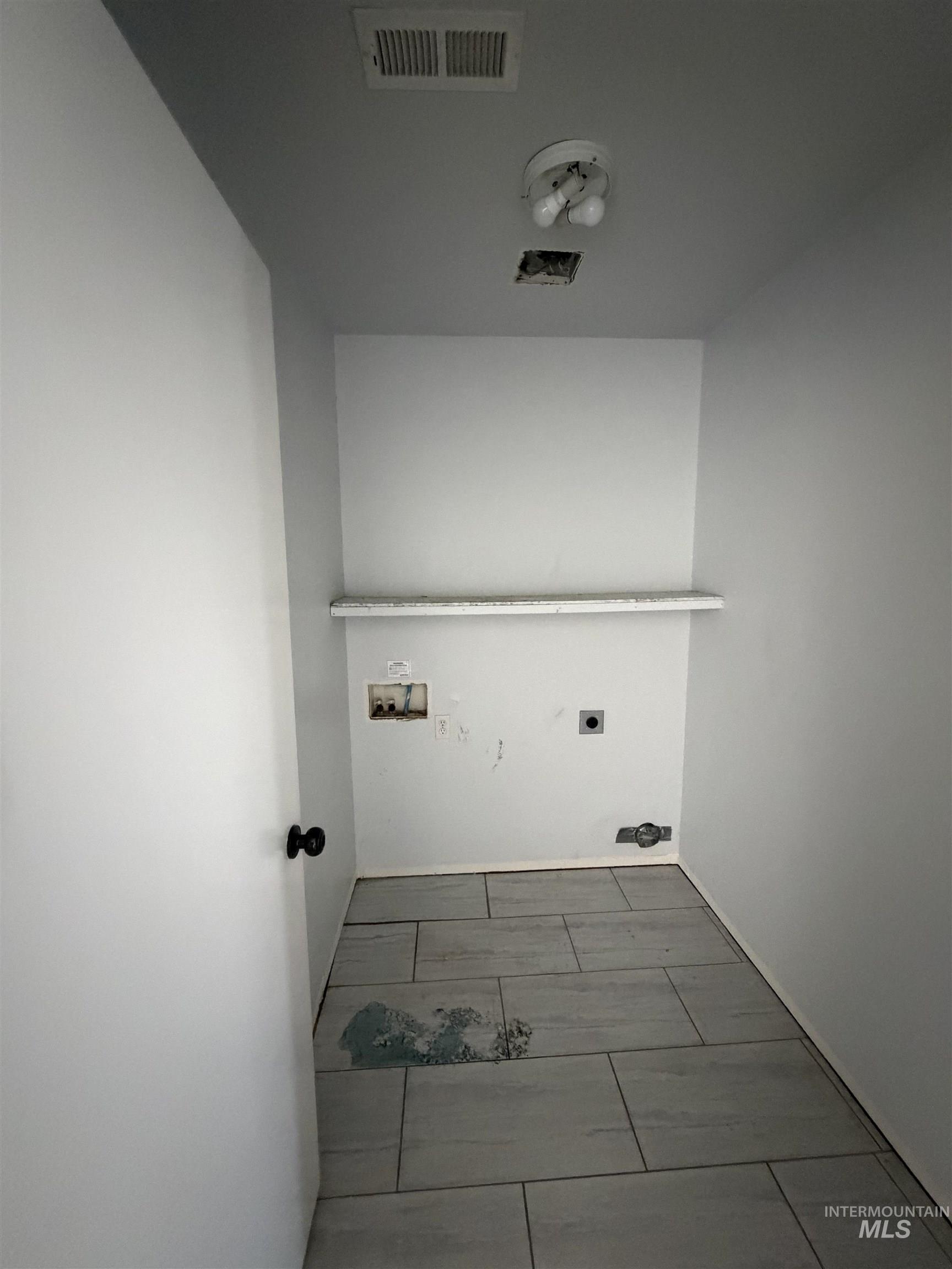 205 Middlepark Way Caldwell, ID 83605 - Photo 11 of 18 Laundry room with washer hookup and electric dryer hookup