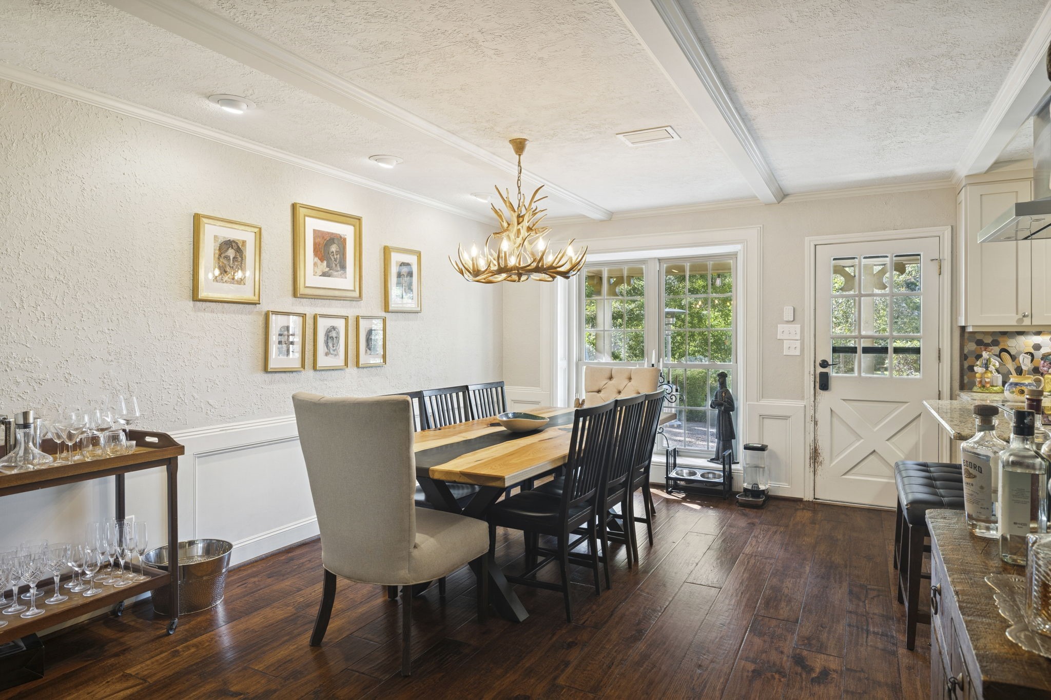 13835 Jarvis Road Cypress, TX 77429 - Photo 11 of 24 a dining room with furniture a chandelier and wooden floor