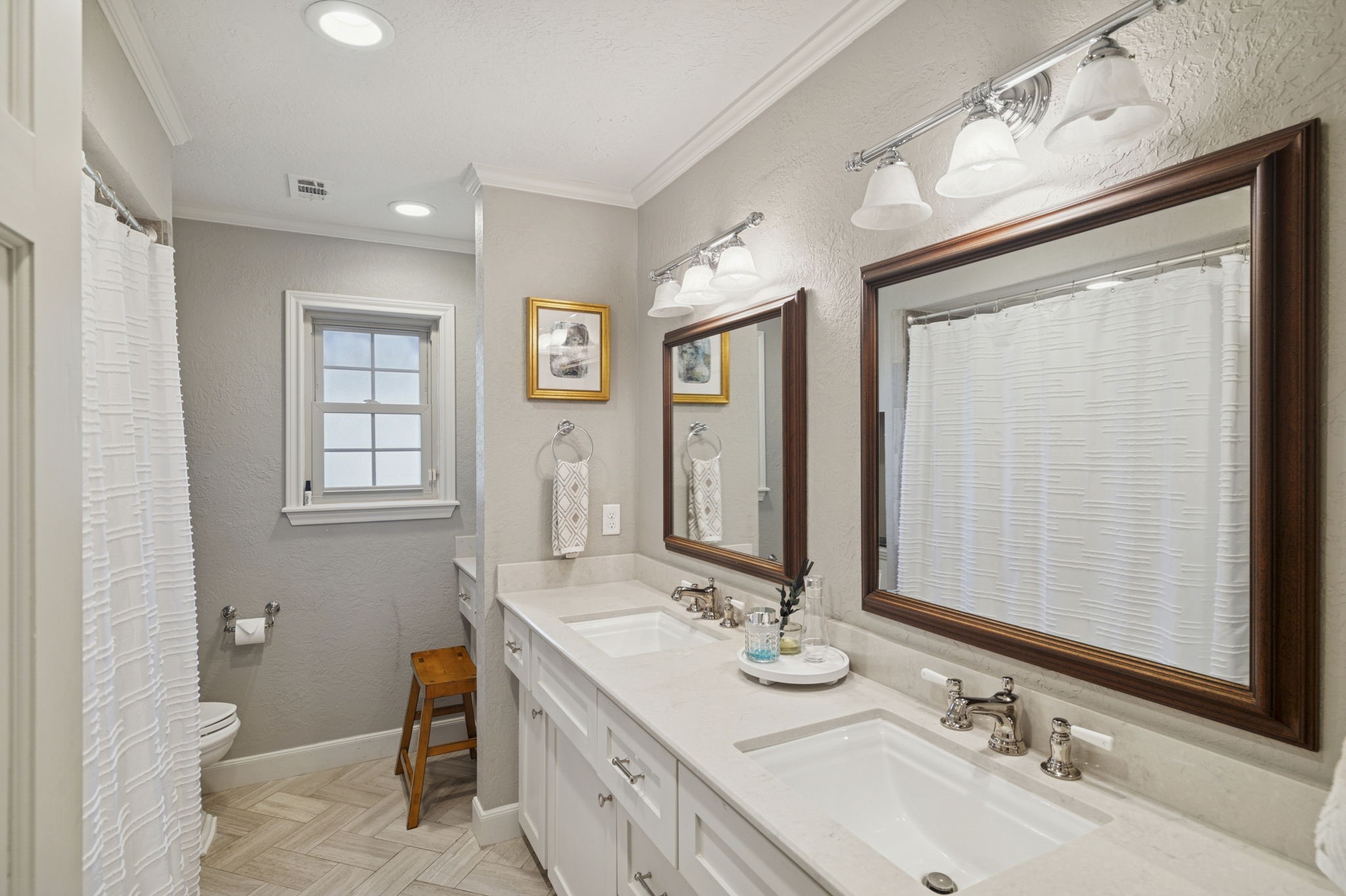 13835 Jarvis Road Cypress, TX 77429 - Photo 15 of 24 a bathroom with 2 sink and a mirror