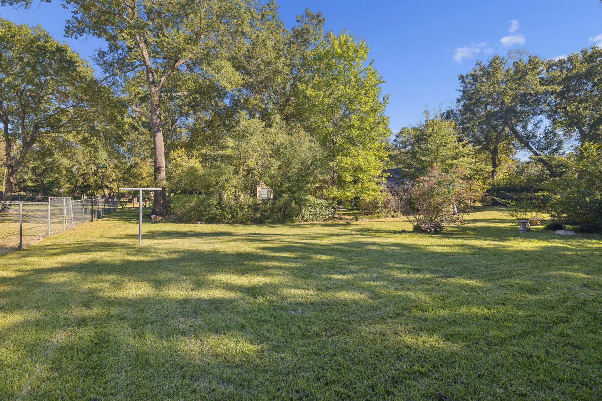 13835 Jarvis Road Cypress, TX 77429 - Photo 21 of 24 a view of yard with swimming pool and green space