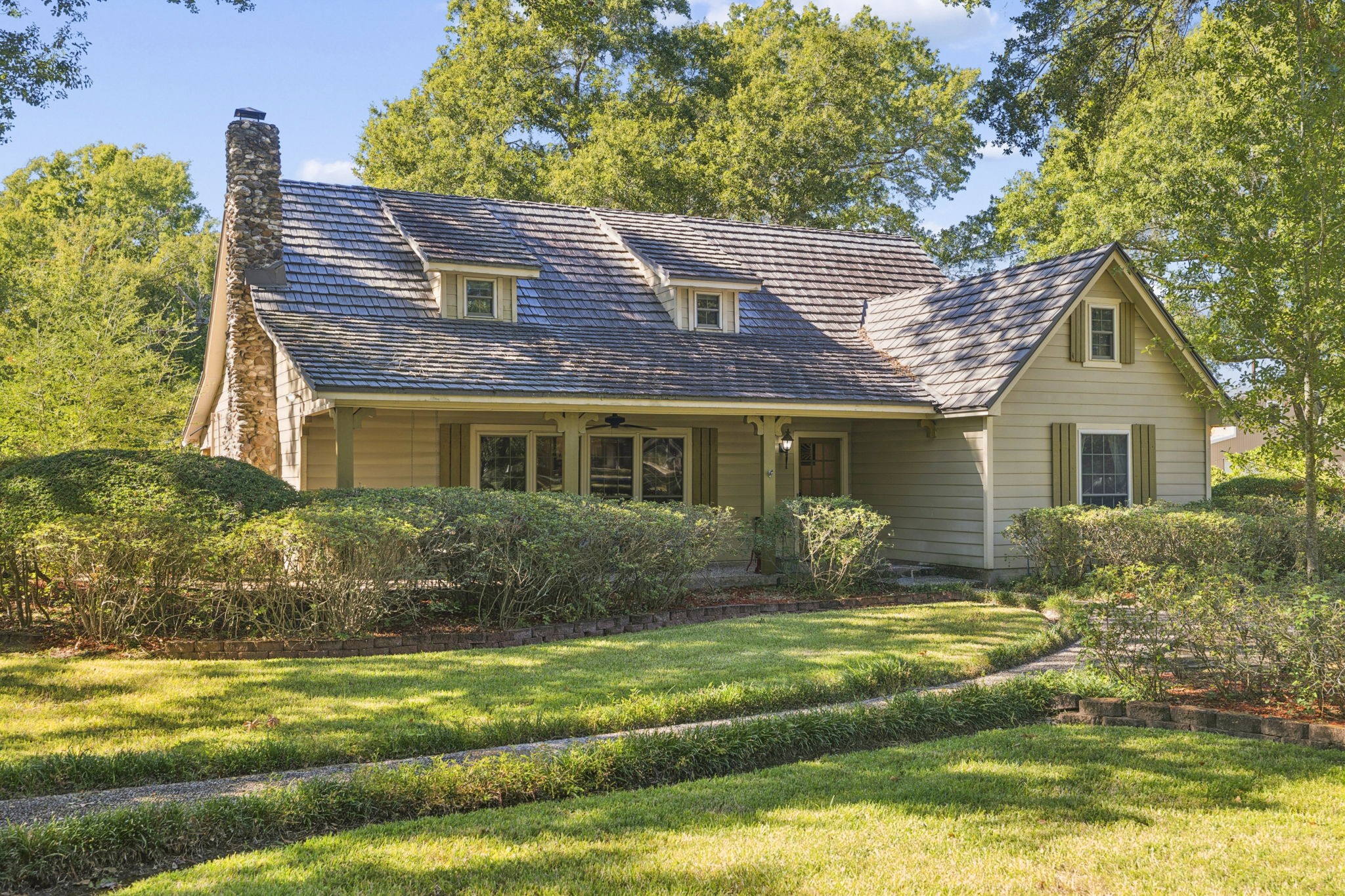 13835 Jarvis Road Cypress, TX 77429 - Photo 4 of 24 a front view of a house with garden