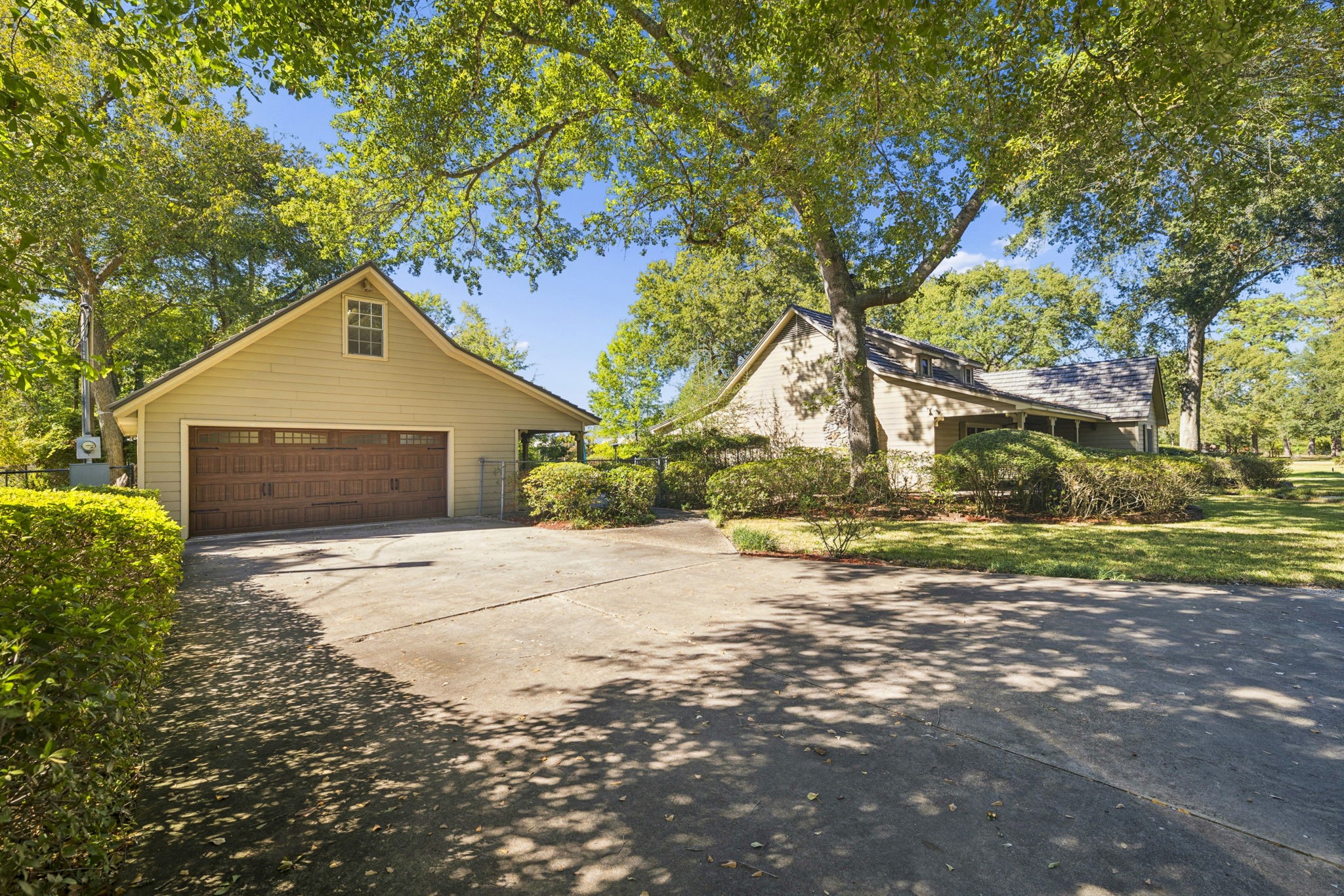 13835 Jarvis Road Cypress, TX 77429 - Photo 5 of 24 a front view of a house with a yard and garage
