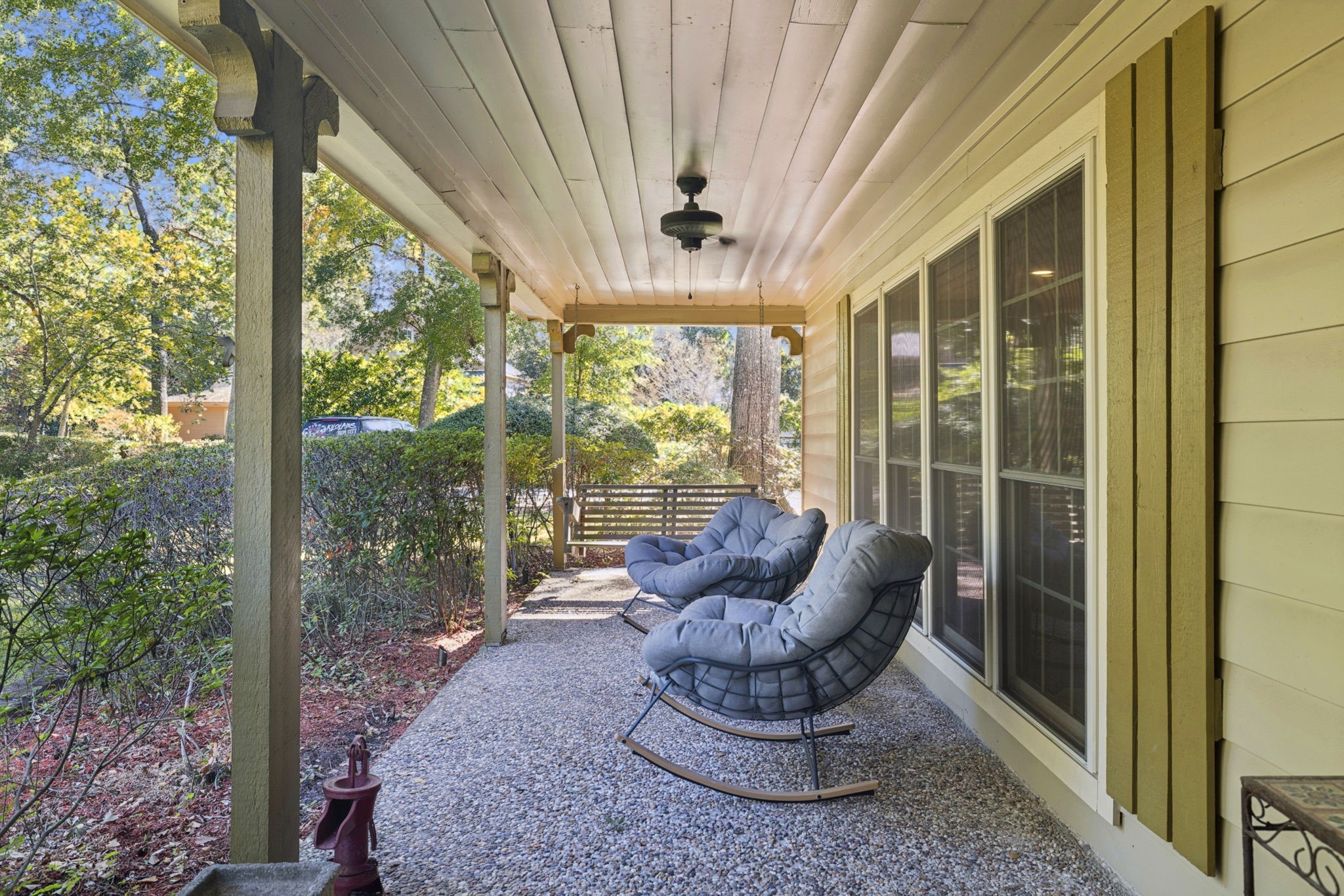 13835 Jarvis Road Cypress, TX 77429 - Photo 6 of 24 a view of a porch with furniture and a potted plant