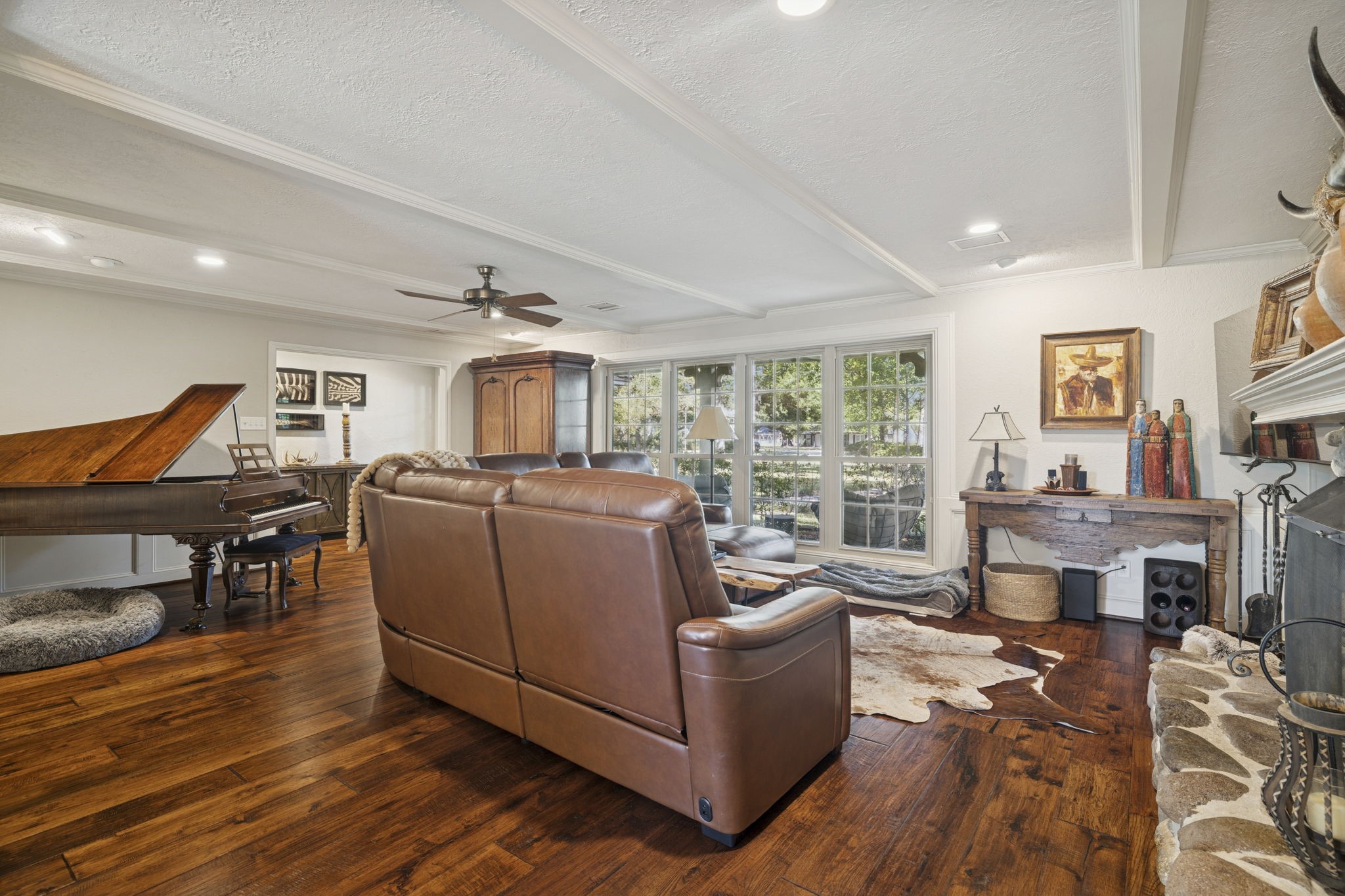 13835 Jarvis Road Cypress, TX 77429 - Photo 7 of 24 a living room with furniture a fireplace and wooden floor