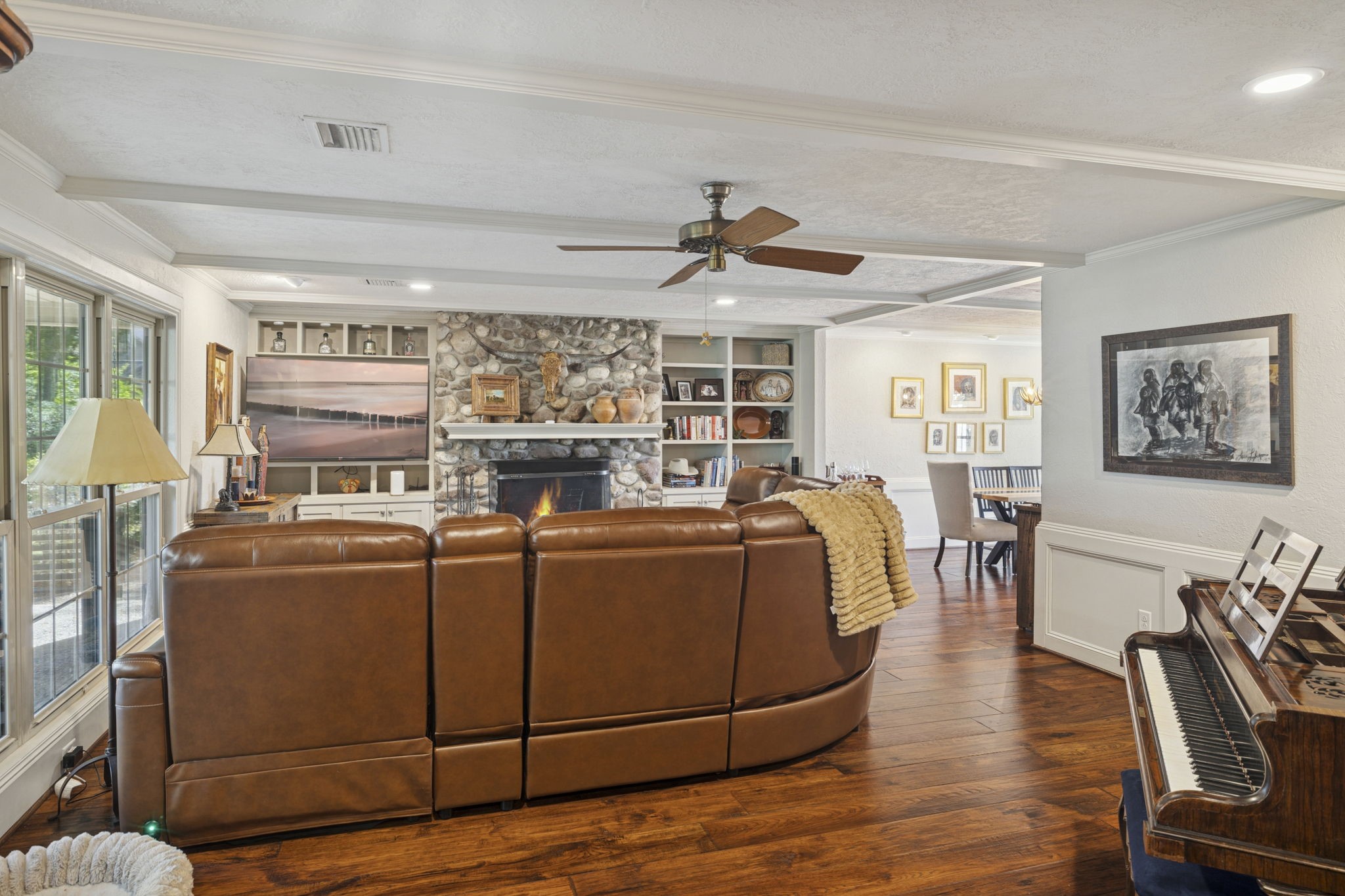 13835 Jarvis Road Cypress, TX 77429 - Photo 8 of 24 a living room with furniture a ceiling fan and a window
