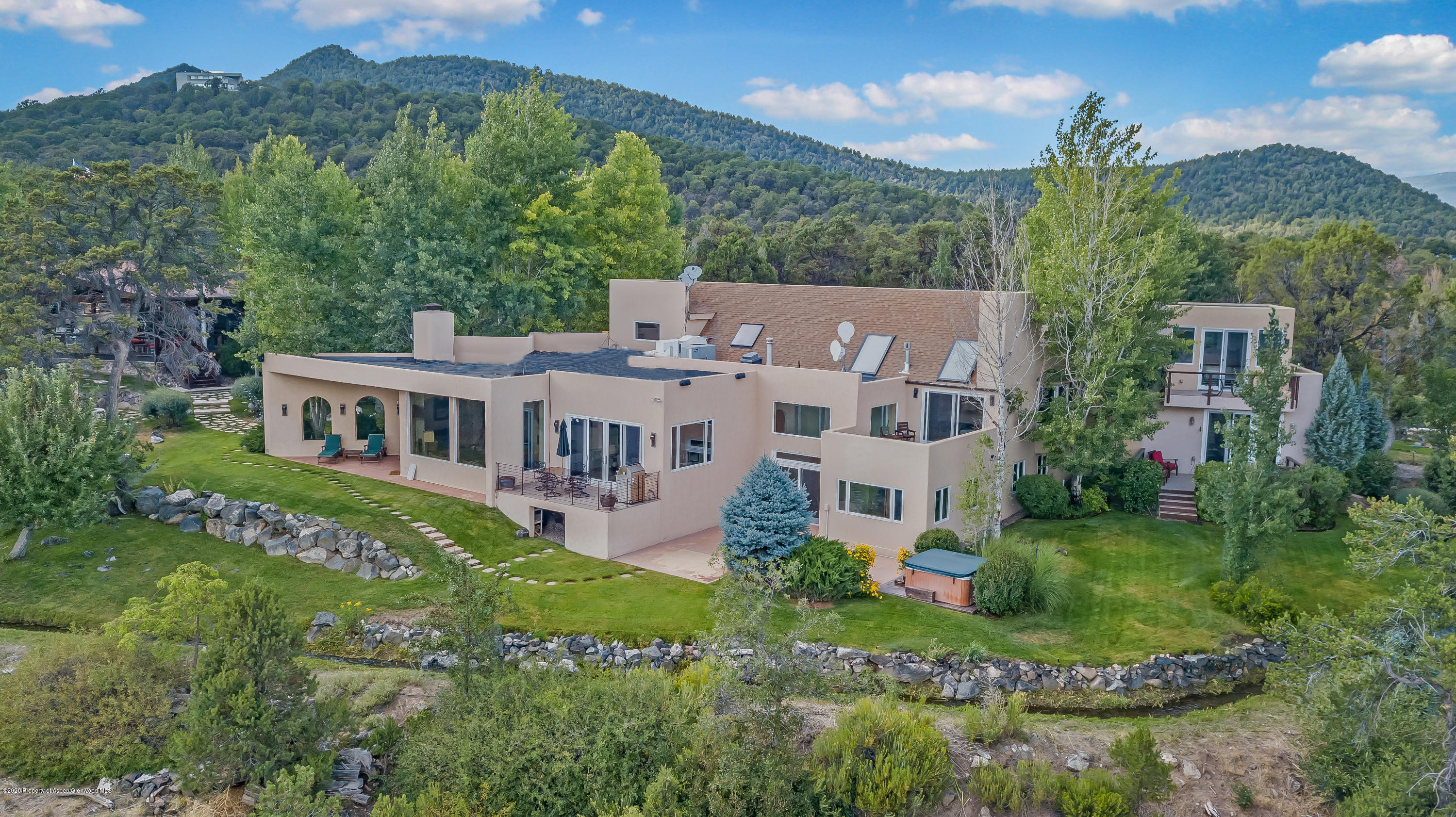 475 County Road 112 Carbondale, CO 81623 - Photo 1 of 53 a aerial view of a house with a garden
