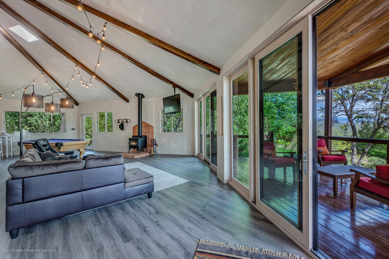 475 County Road 112 Carbondale, CO 81623 - Photo 35 of 53 a living room with furniture and a floor to ceiling window